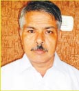 Dr R K Mishra