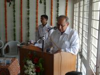 Honourable Minister shri Babubhai Bokhiria addressing college staff, students and farmers at inaugural ceremony