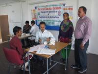 Personnel from Indian Red Cross Society taking blood sample for Thalassemia test